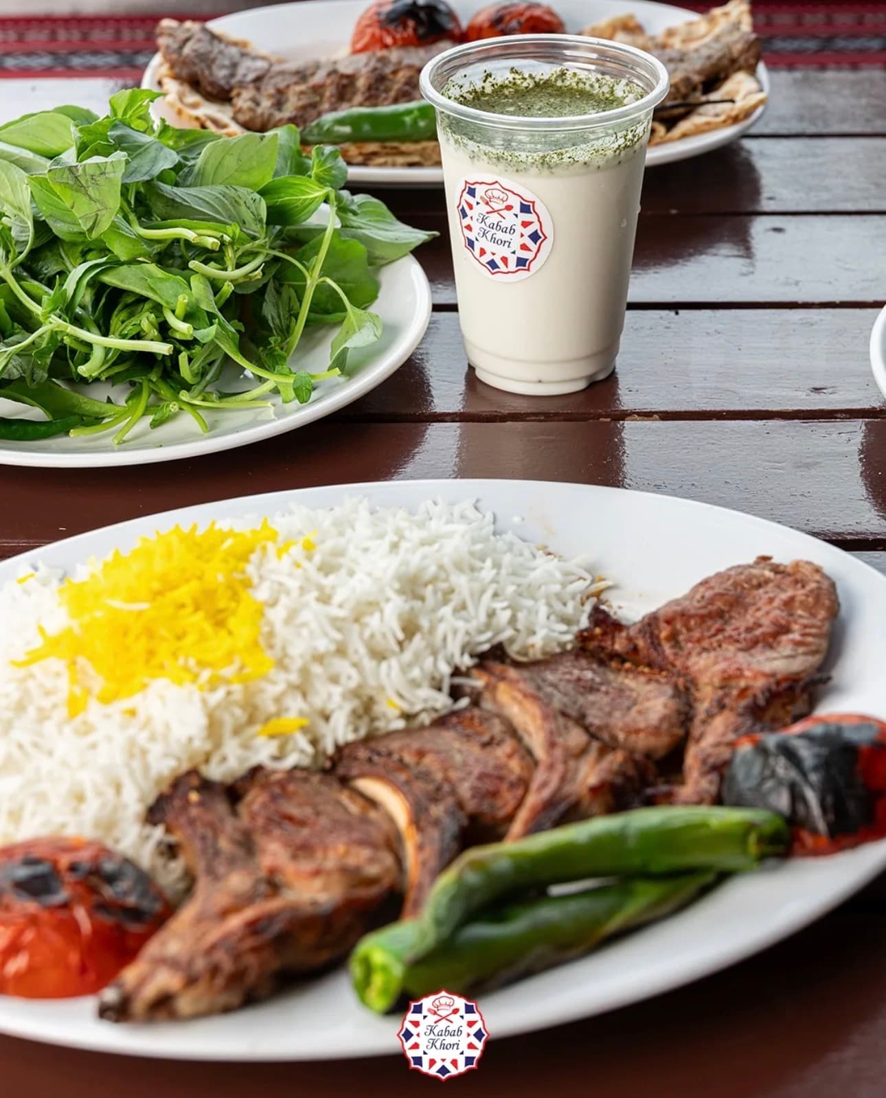 A family enjoying a Persian feast at Khori Special Kabab in Dubai